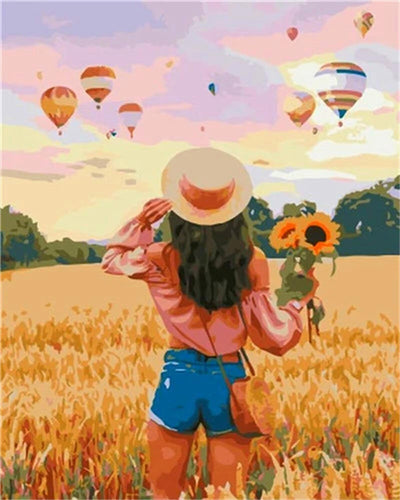Woman Holding Sunflowers in Golden Wheat Field Diamond Painting