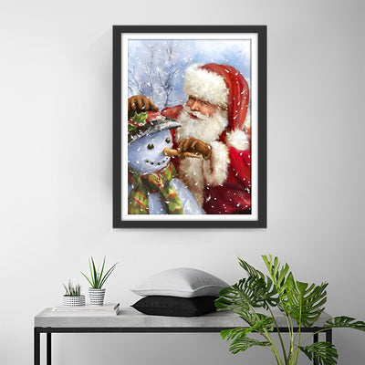 Santa Claus giving a snowman a nose Diamond Painting