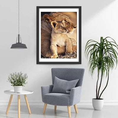 Lioness holding her lion cub Diamond Painting